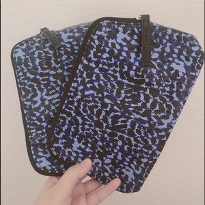 Two Estée Lauder Cosmetic bags animal print